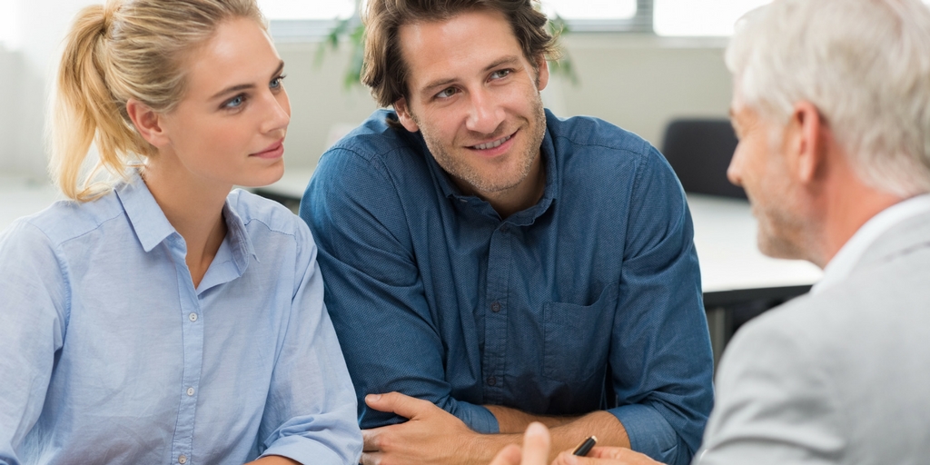 couple talking to finance advisor