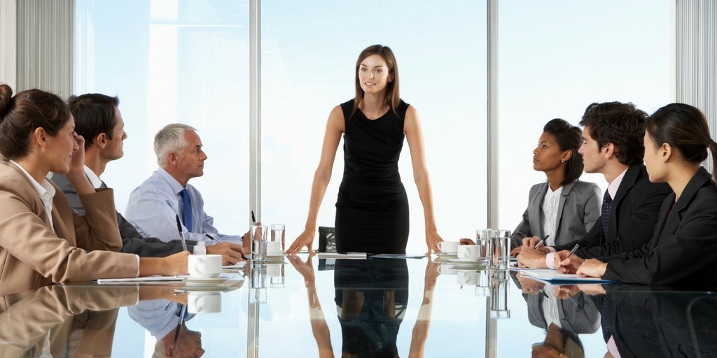 business lady at front of conference table