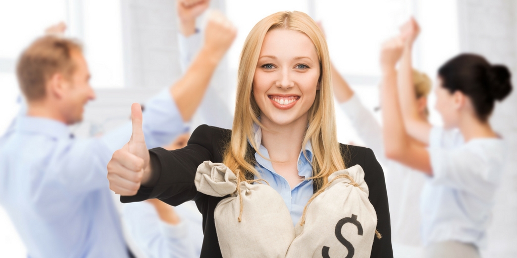 happy business woman giving thumbs up